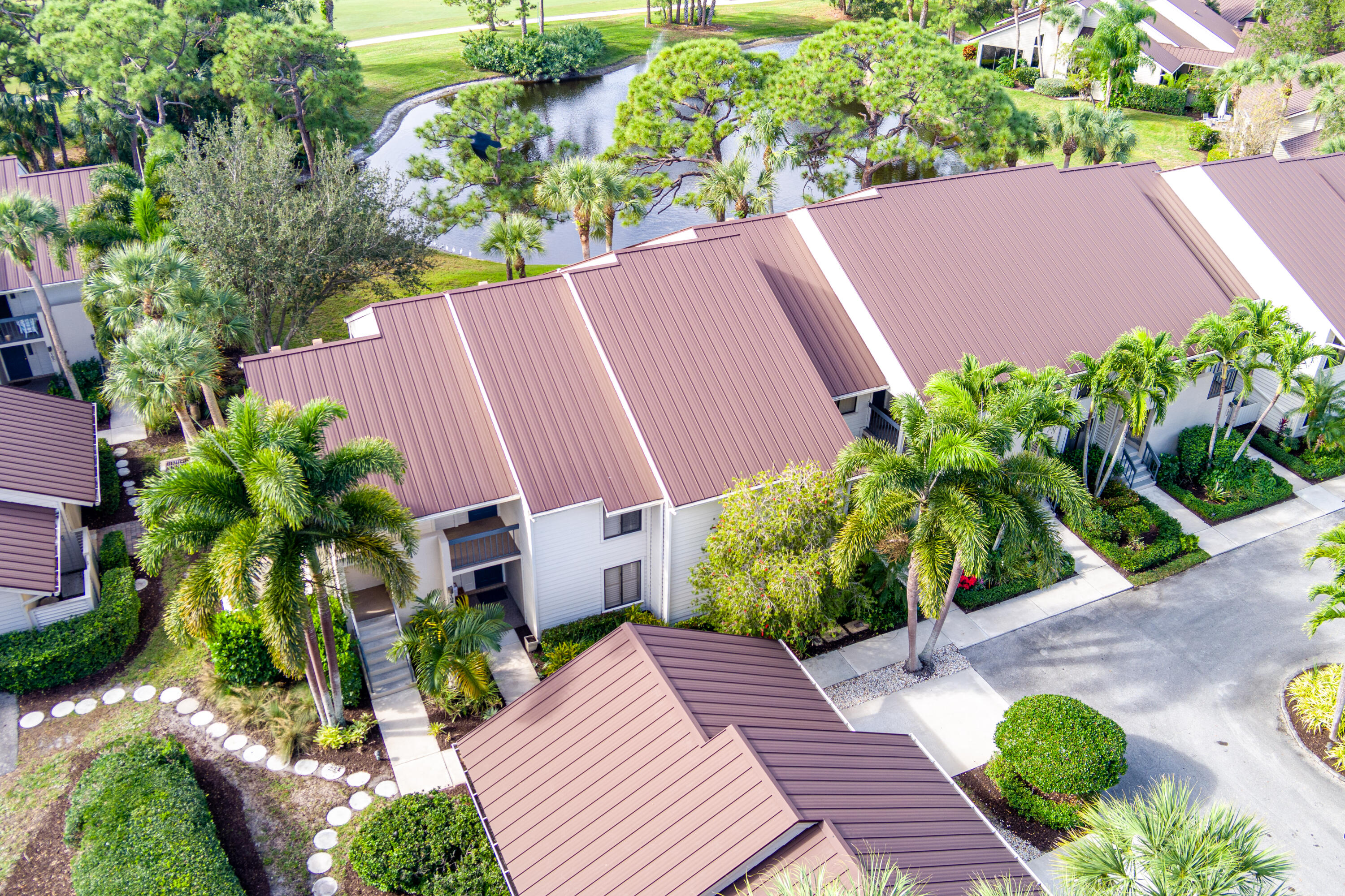 6404 Southeast Brandywine Court, Unit 104 Stuart, FL 34997 - Photo 43 of 57 Condo Entrance Drone
