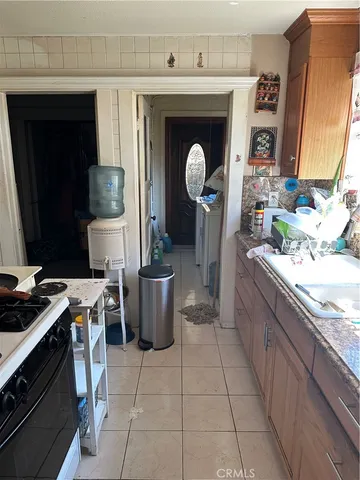 a kitchen with a stove and a microwave
