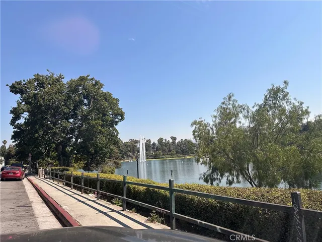 a view of a balcony with two chairs