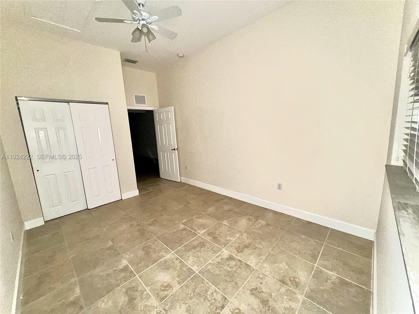 1253 Southwest 2nd Street, Unit 209 Miami, FL 33135 - Photo 5 of 11 a view of an empty room