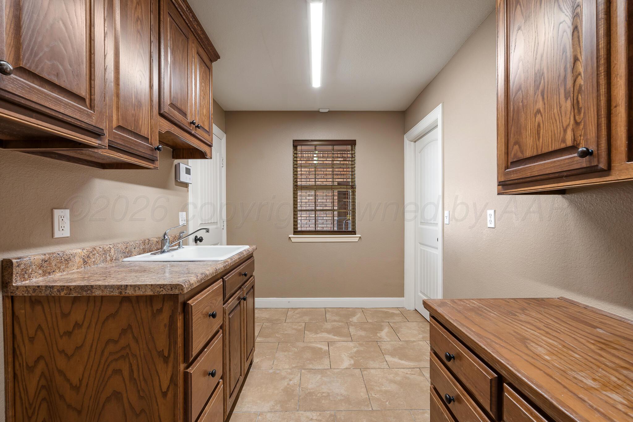 6903 Spring Cherry Lane Amarillo, TX 79124 - Photo 34 of 41 Utility Room 1