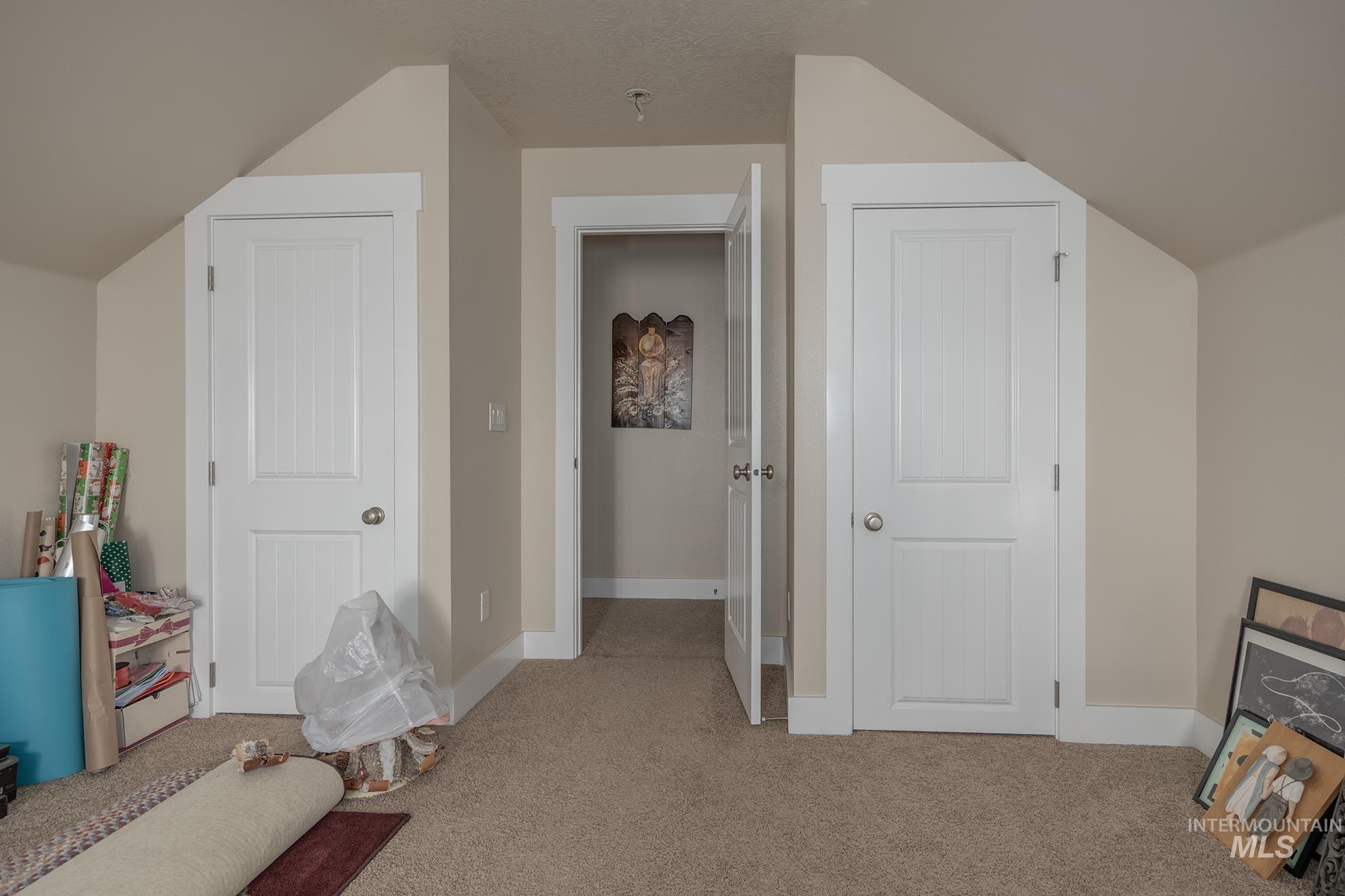 420 West Indianhead Road Weiser, ID 83672 - Photo 29 of 40 Carpeted interior space with neutral wall tones and white trim