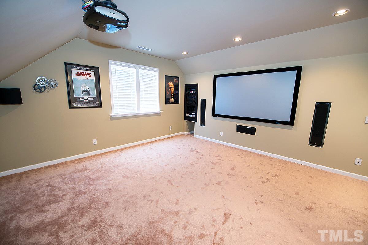 5005 Contender Drive Raleigh, NC 27603 - Photo 17 of 21 a view of an empty room with a window