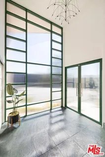 a view of empty room with a window