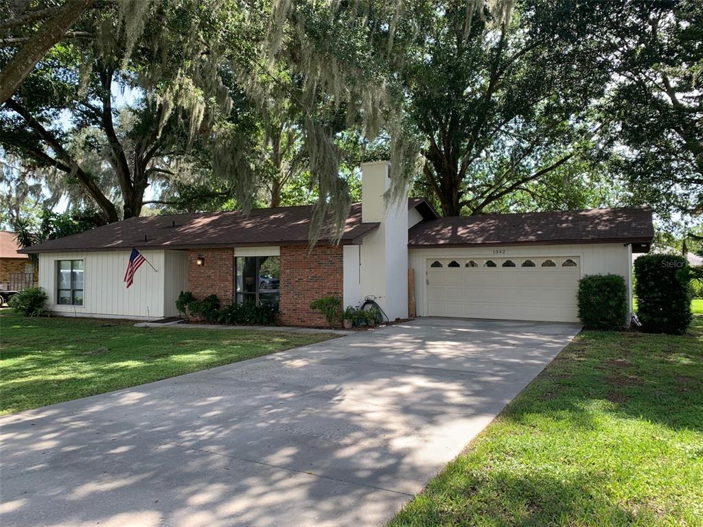 1342 Eustis Road Eustis, FL 32726 - Photo 1 of 1 3 BEDROOM 2 BATH HOME WITH A DOUBLE CAR GARAGE AND OVERSIZED DRIVEWAY