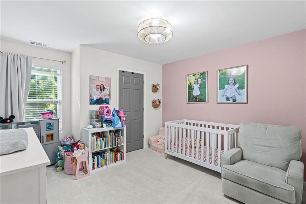 3675 Rosedale Circle Gainesville, GA 30506 - Photo 17 of 32 a bedroom with furniture and a window