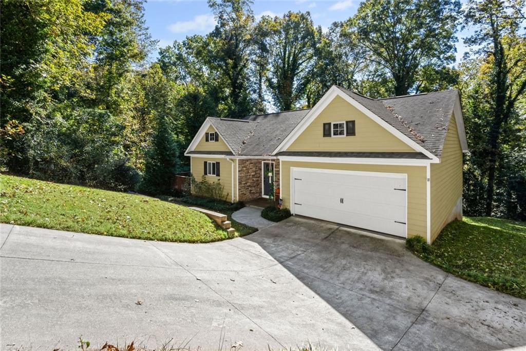 3675 Rosedale Circle Gainesville, GA 30506 - Photo 3 of 32 a house with green field in front of it