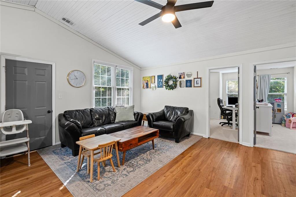 3675 Rosedale Circle Gainesville, GA 30506 - Photo 8 of 32 a living room with furniture and a window