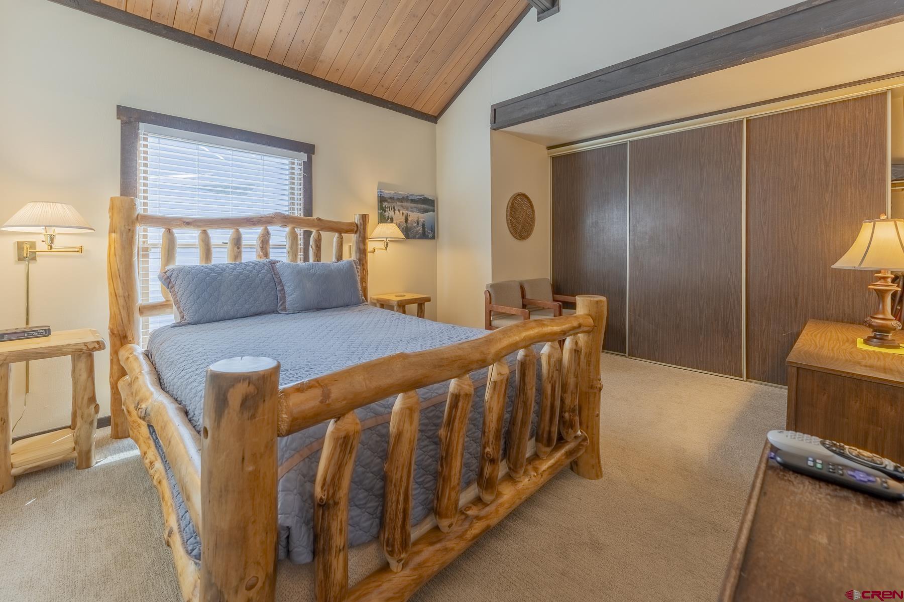 18 Hunter Hill Road, Unit J304 Crested Butte, CO 81225 - Photo 19 of 40 a bedroom with furniture and a window