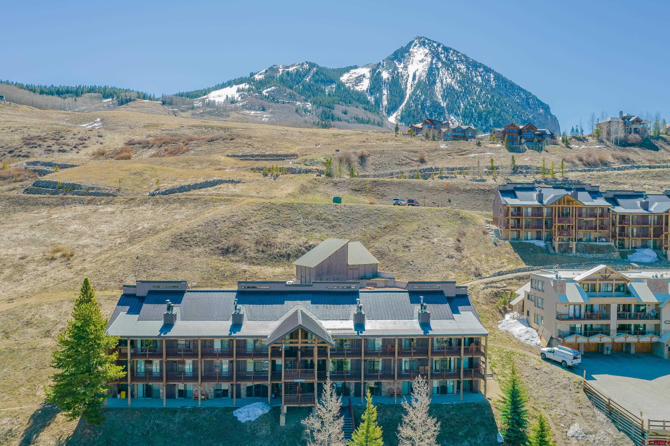 18 Hunter Hill Road, Unit J304 Crested Butte, CO 81225 - Photo 32 of 40 a roof deck view with tall buildings and ocean view
