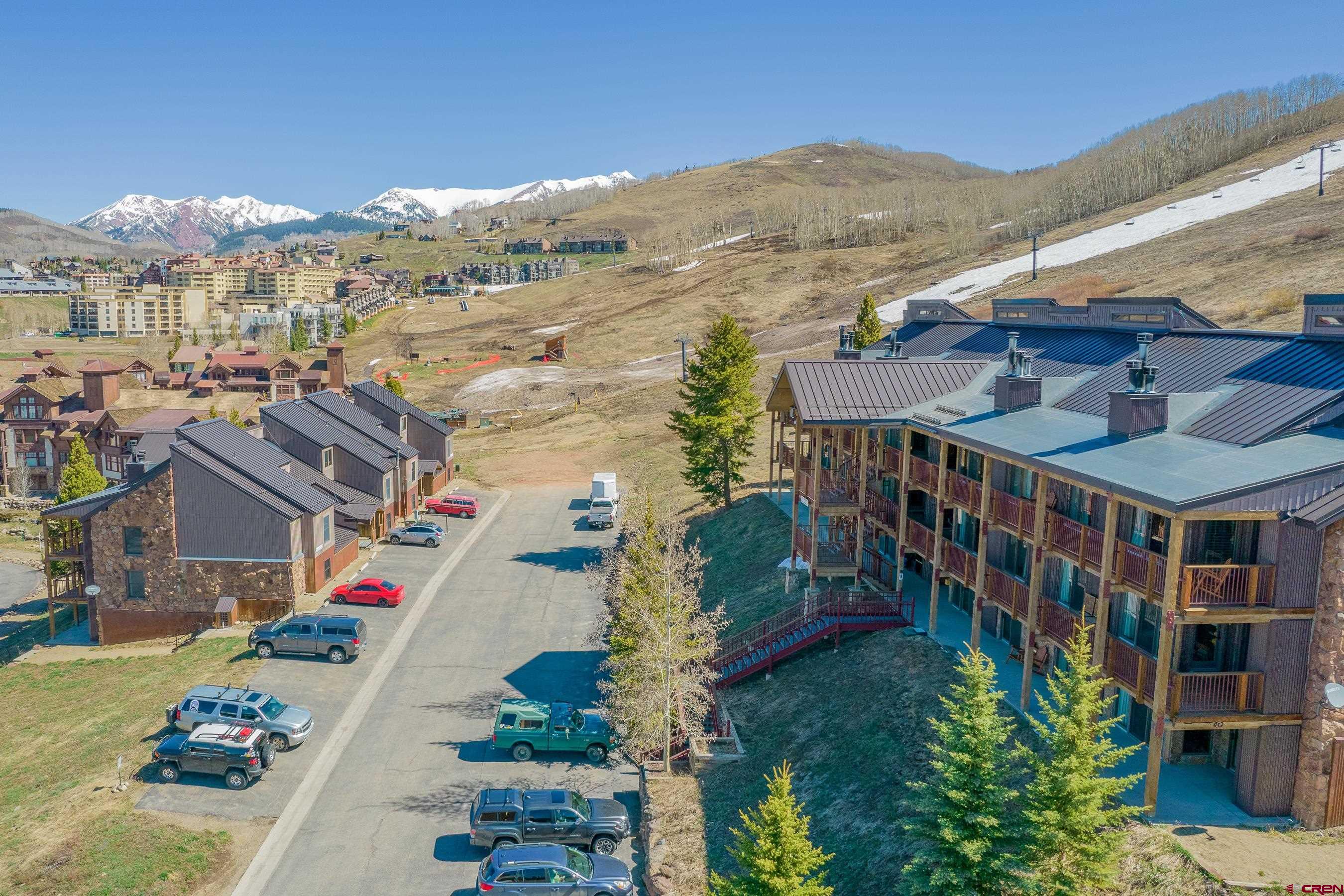 18 Hunter Hill Road, Unit J304 Crested Butte, CO 81225 - Photo 34 of 40 a view of multiple houses with a yard