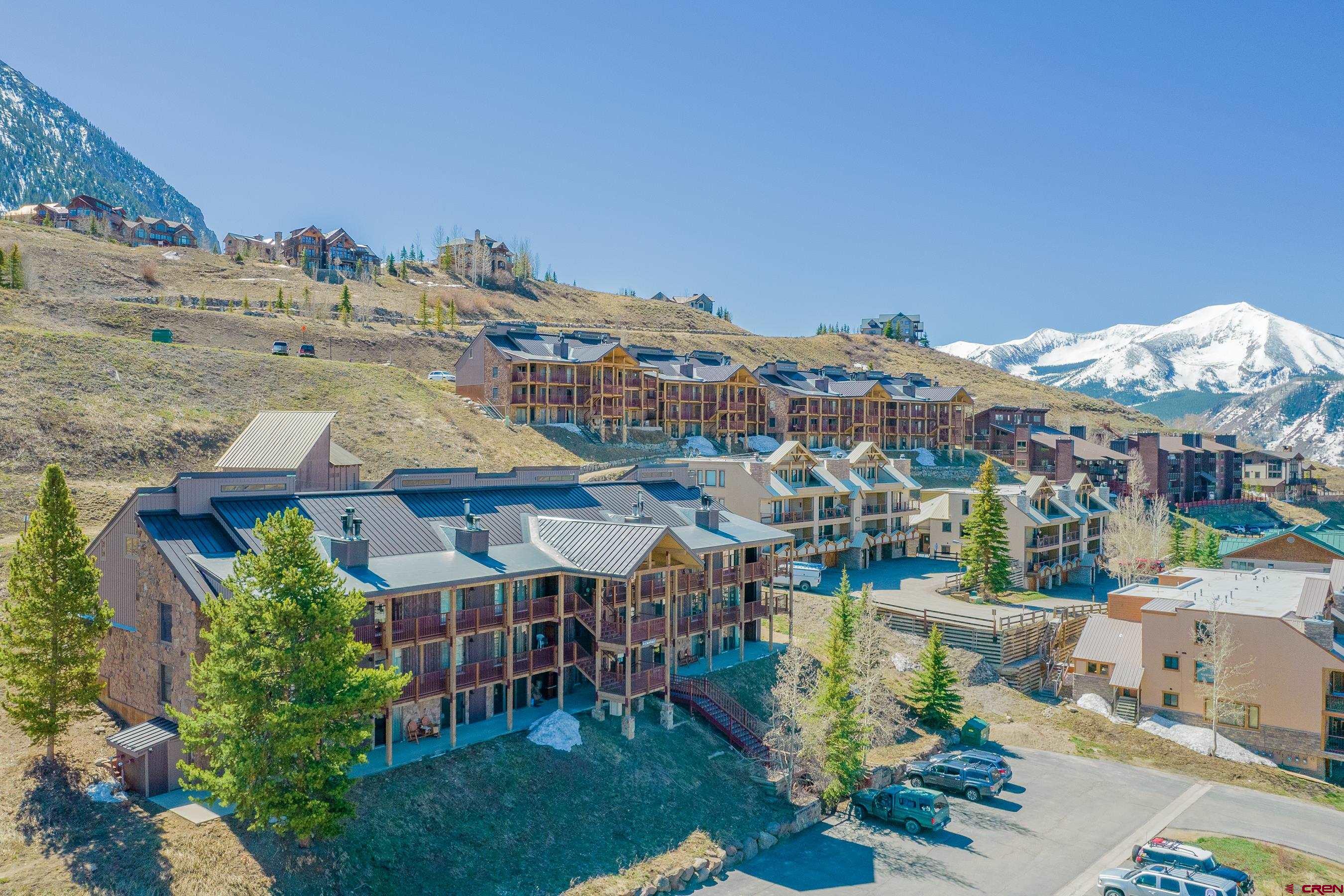 18 Hunter Hill Road, Unit J304 Crested Butte, CO 81225 - Photo 36 of 40 a view of a city with tall buildings