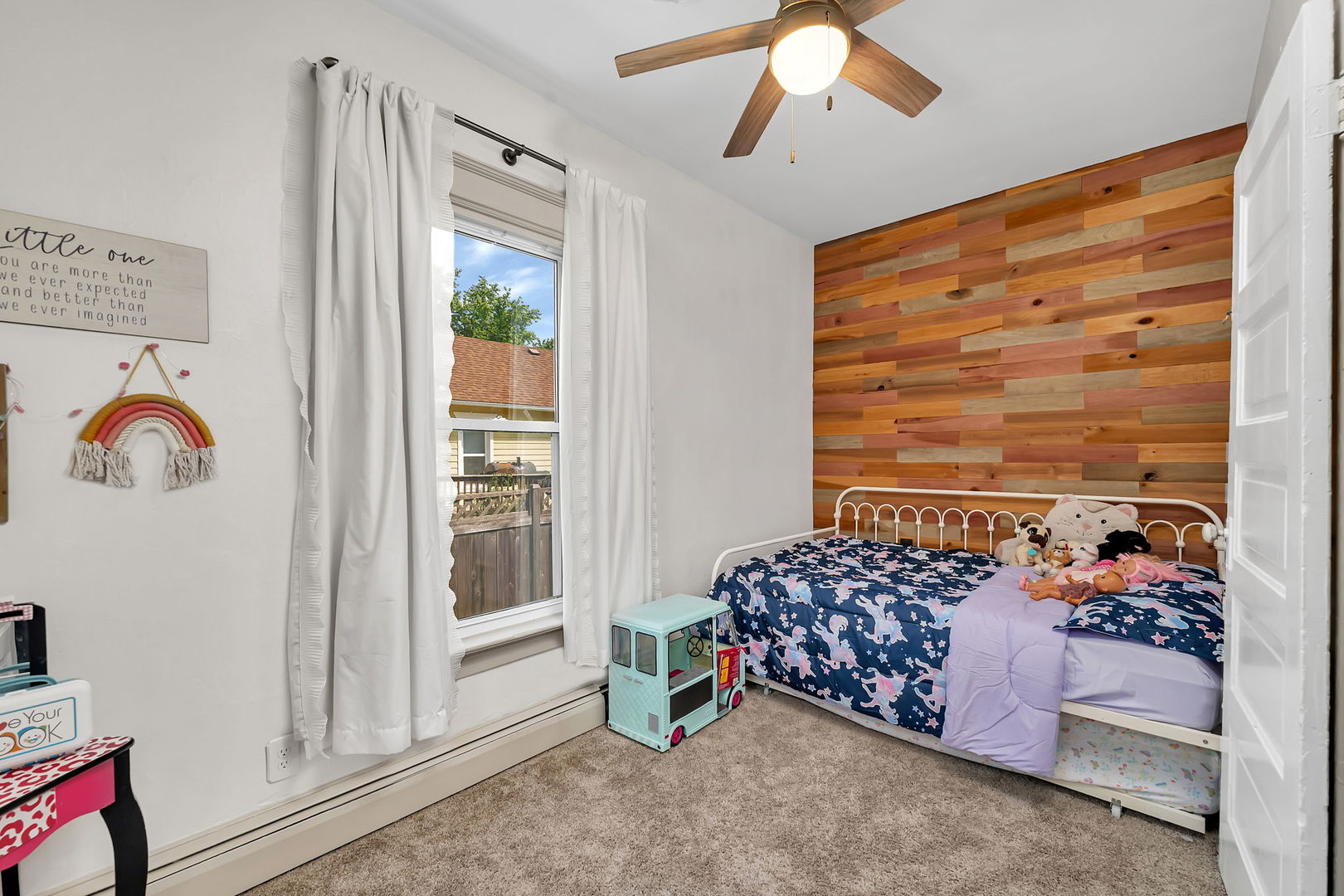 1122 Grant Street Morris, IL 60450 - Photo 11 of 25 a bedroom with a bed and a window