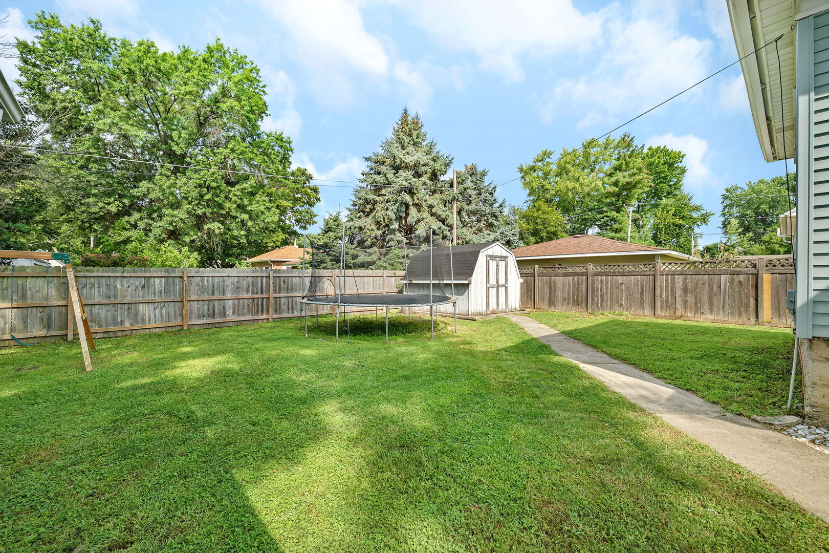 1122 Grant Street Morris, IL 60450 - Photo 24 of 25 a view of yard with grass and trees