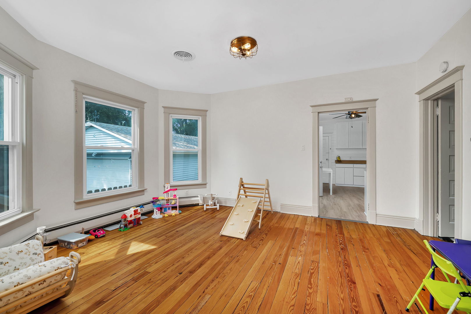 1122 Grant Street Morris, IL 60450 - Photo 7 of 25 a bed room with a bed and dresser