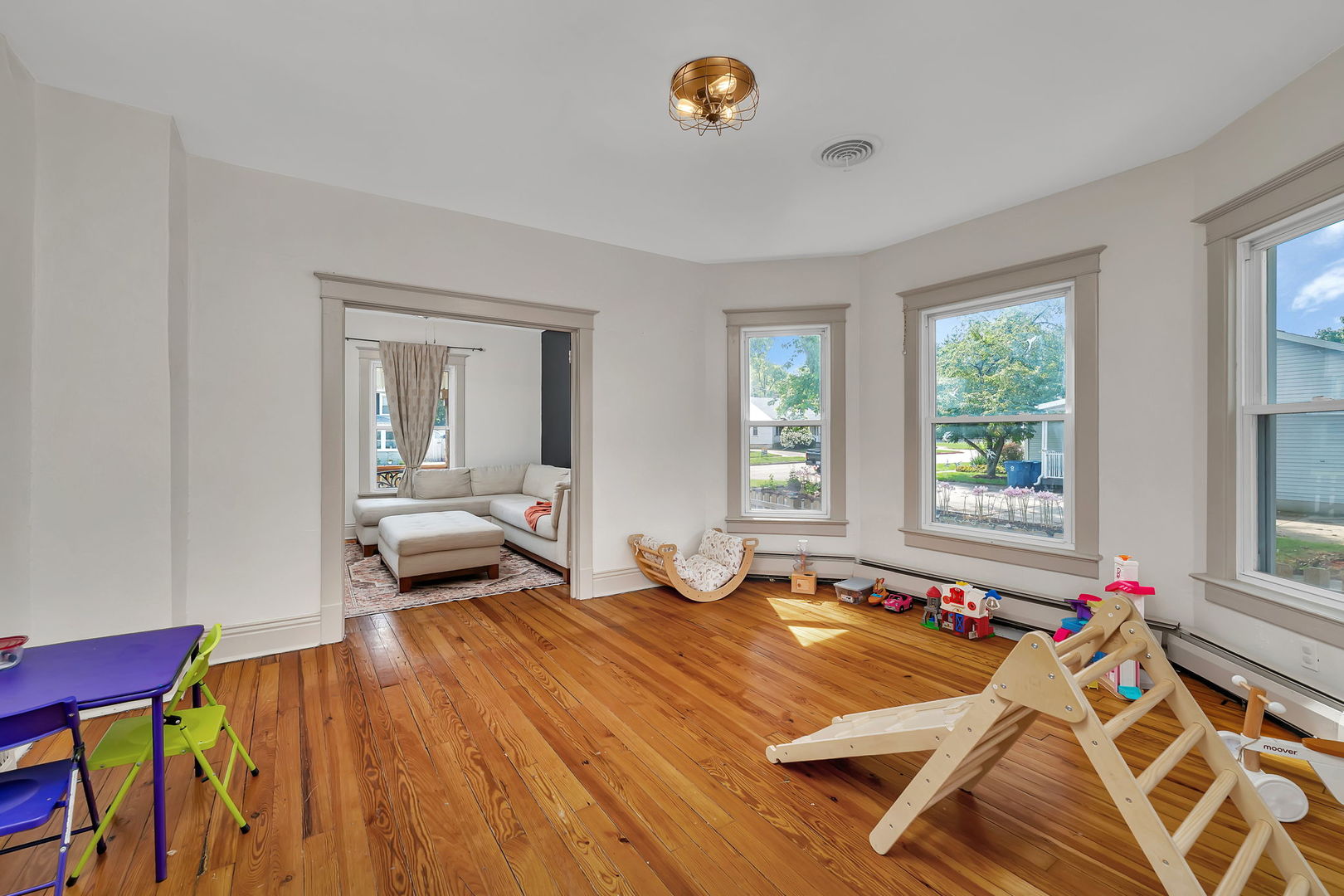 1122 Grant Street Morris, IL 60450 - Photo 8 of 25 a bed room with a bed and a chair