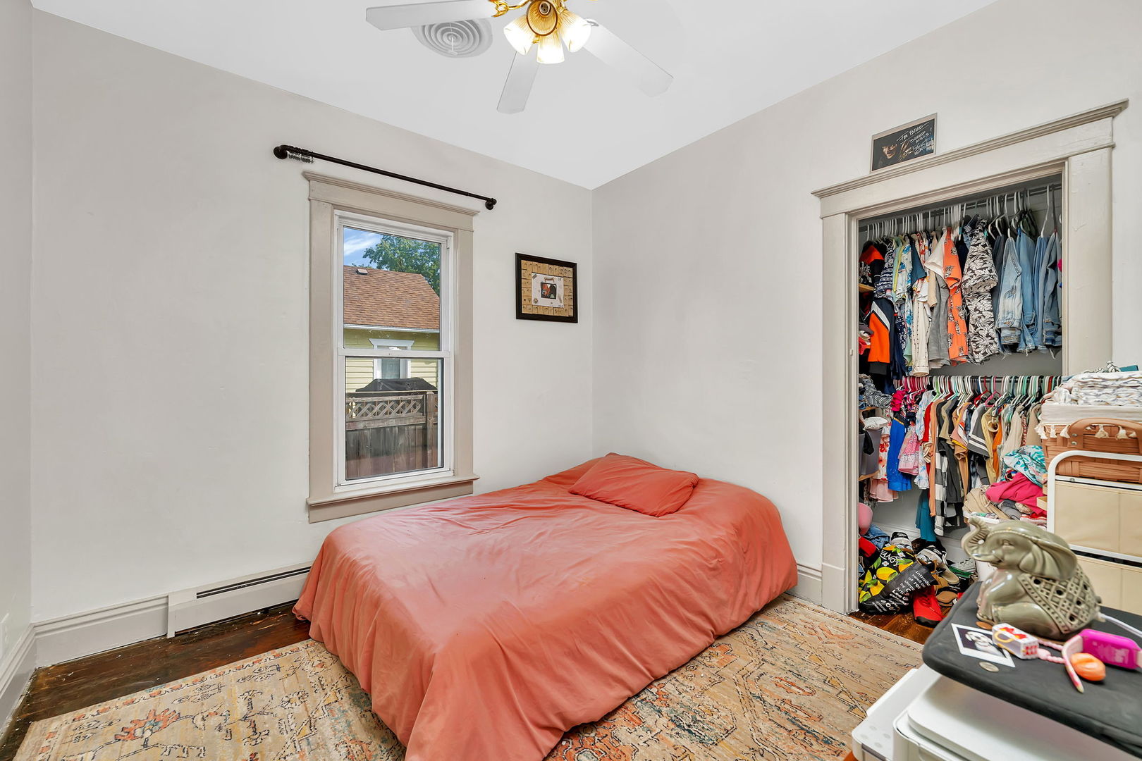 1122 Grant Street Morris, IL 60450 - Photo 10 of 25 a bedroom with a bed and a window