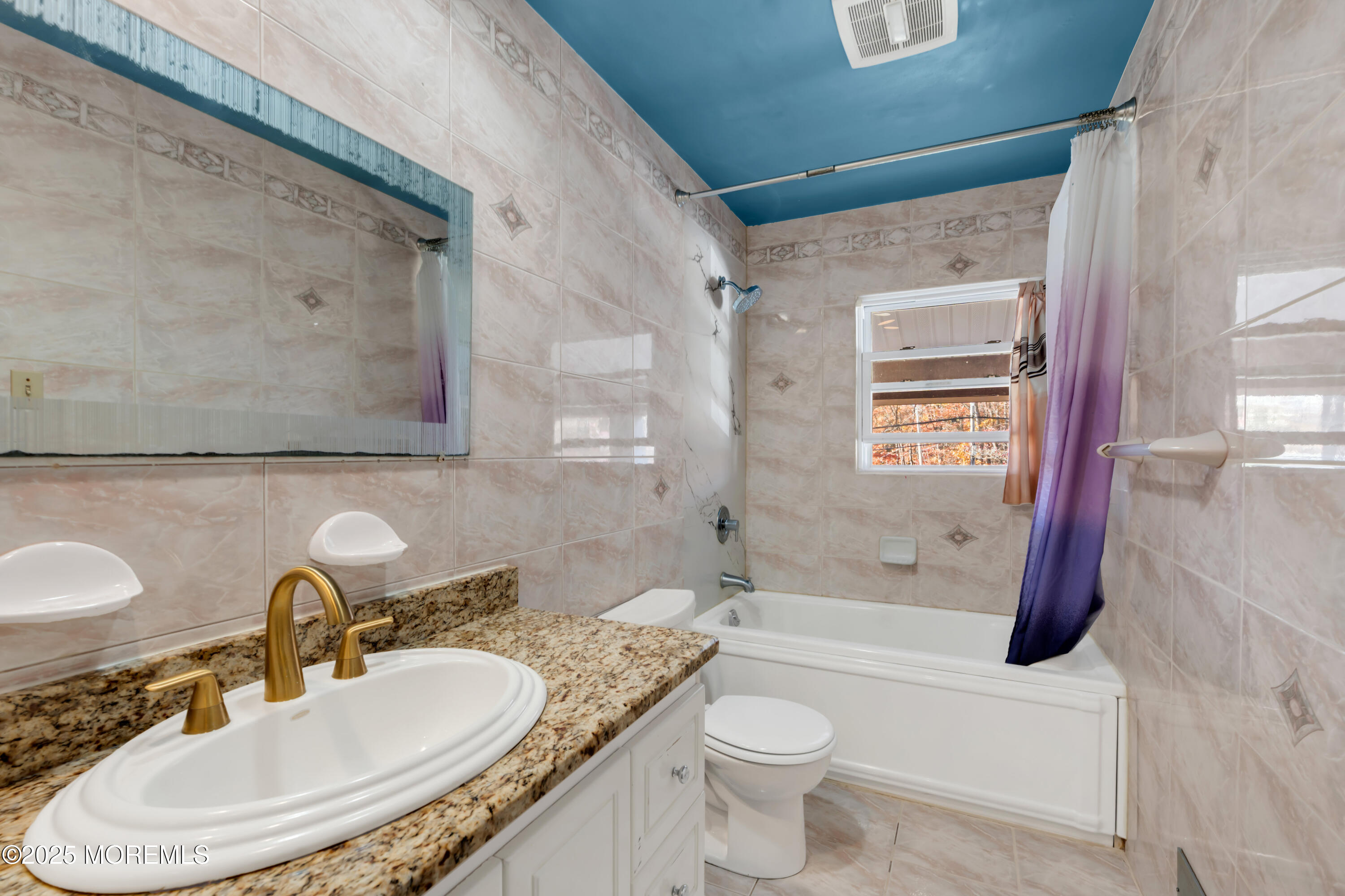 95 Marginal Road Jackson, NJ 08527 - Photo 12 of 24 a bathroom with a granite countertop sink toilet and shower
