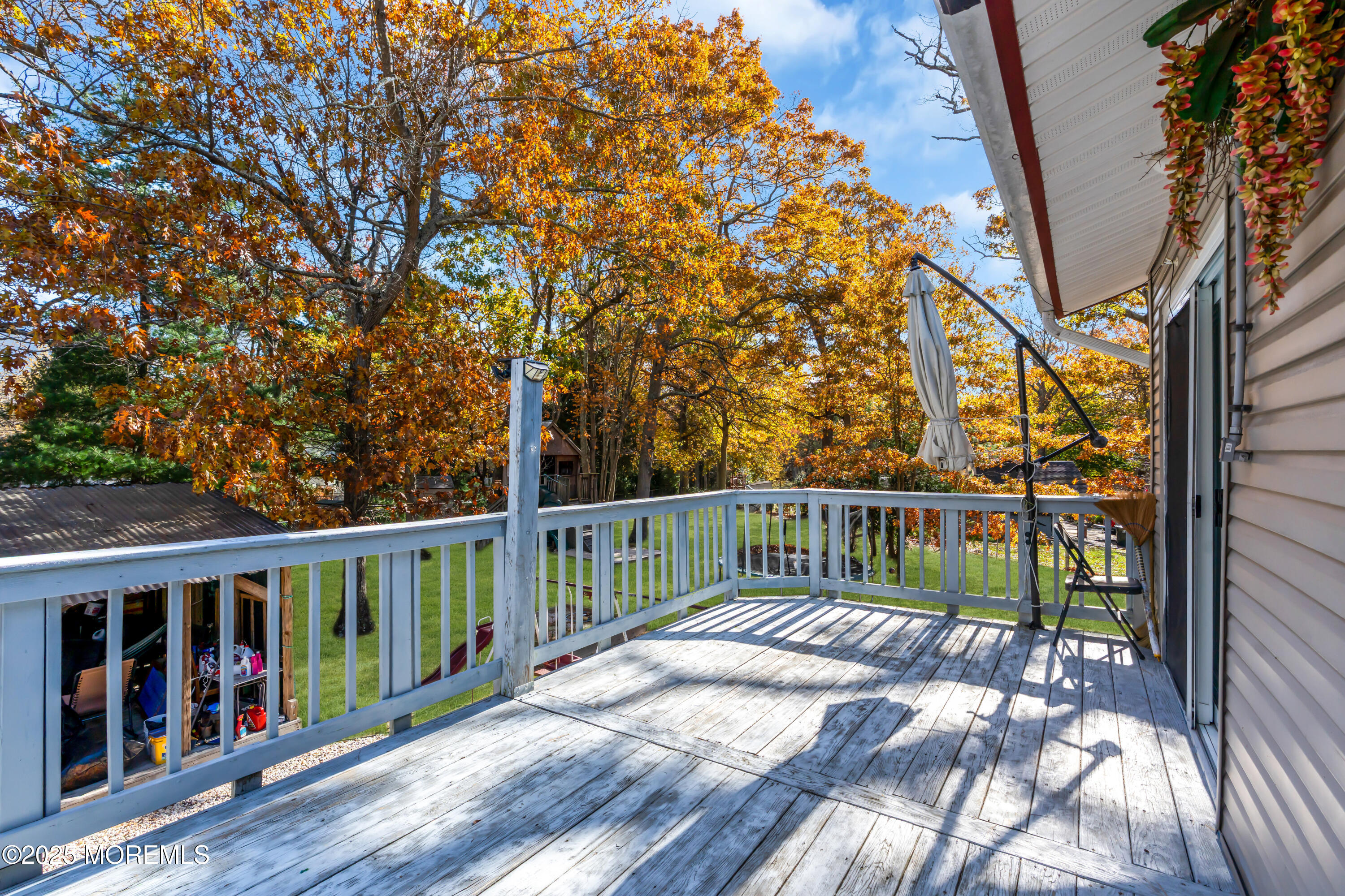 95 Marginal Road Jackson, NJ 08527 - Photo 17 of 24 a view of balcony with wooden floor and fence