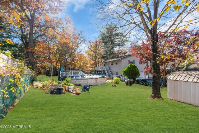a view of a house with a back yard
