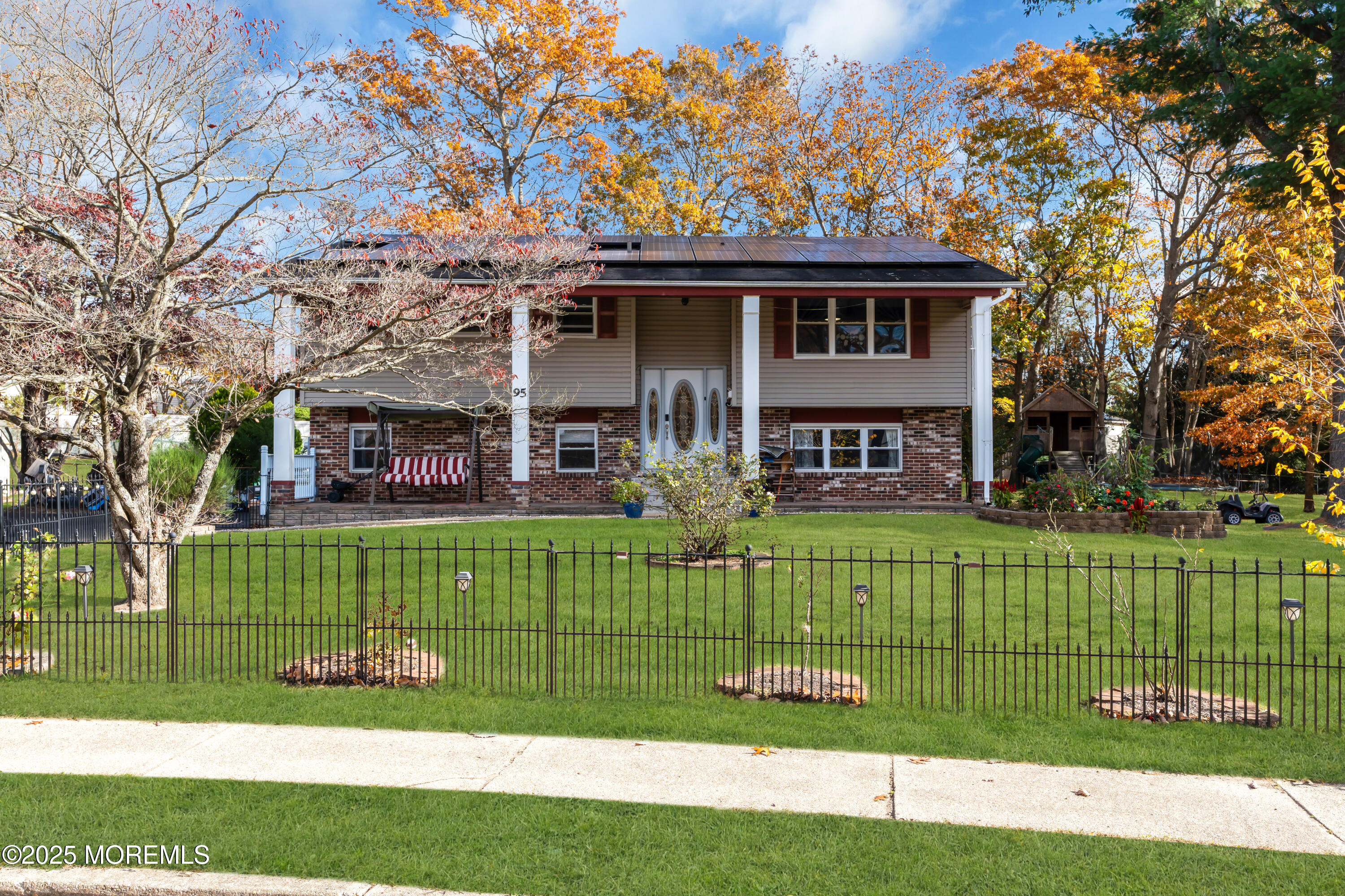 95 Marginal Road Jackson, NJ 08527 - Photo 2 of 24 front view of a house with a big yard