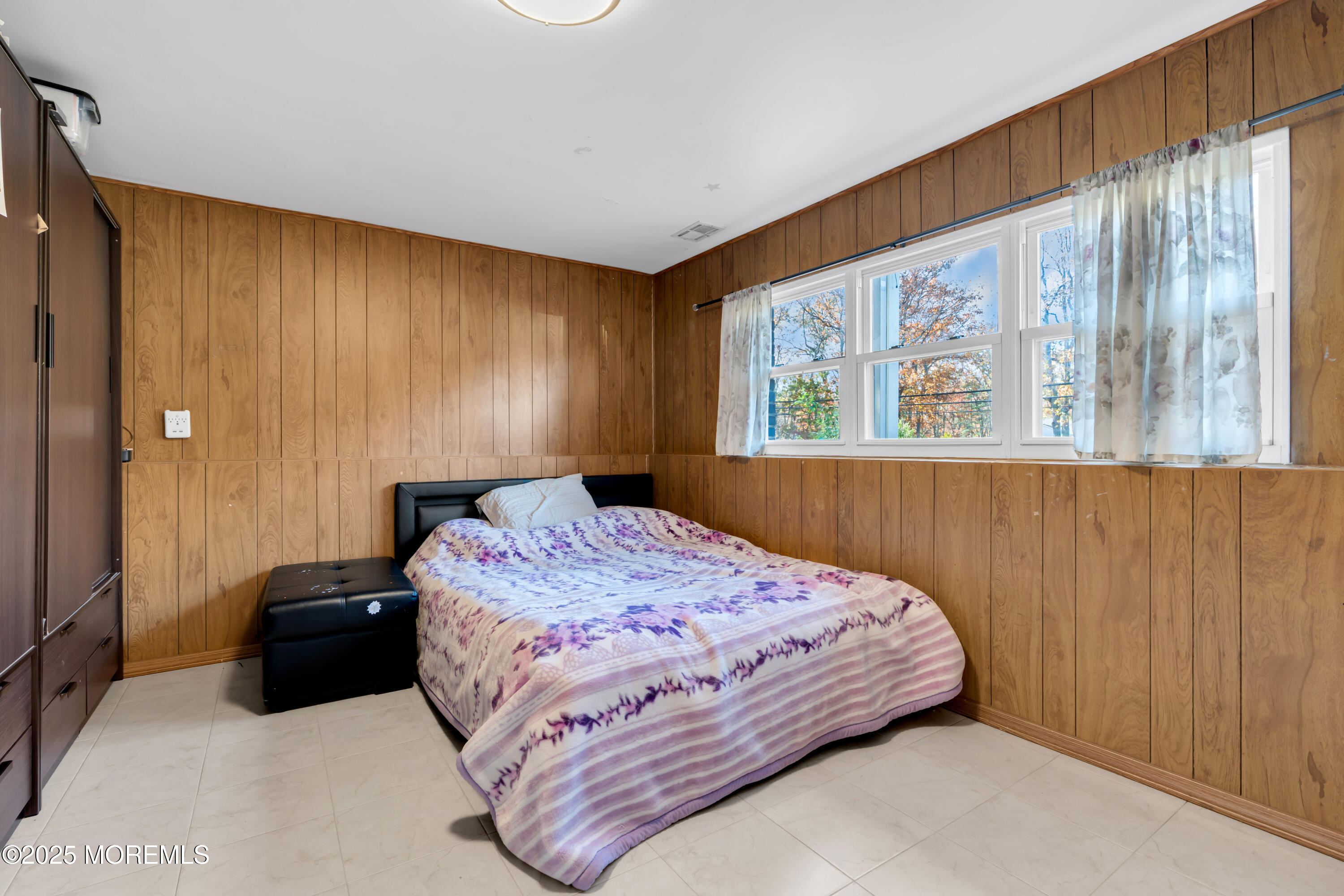 95 Marginal Road Jackson, NJ 08527 - Photo 8 of 24 a bedroom with a bed and a window