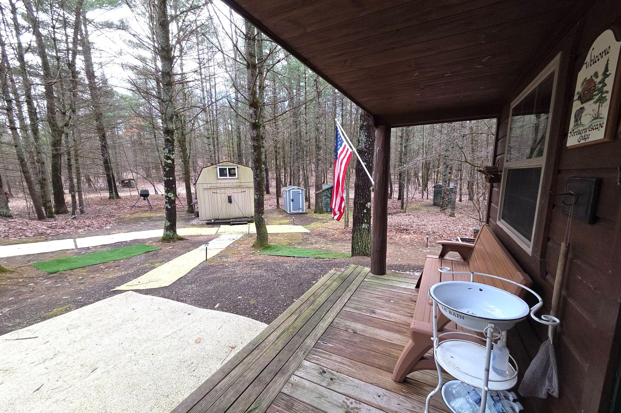 0 East Del Vandell Road Chase, MI 49623 - Photo 6 of 50 Cabin Porch