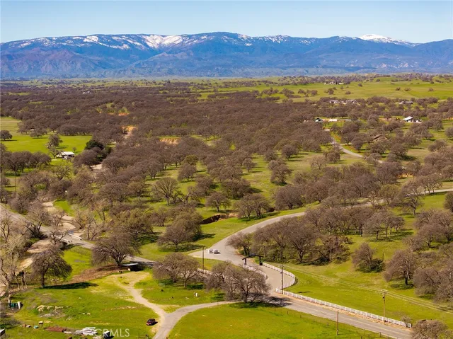 a view of a swimming pool with an ocean view