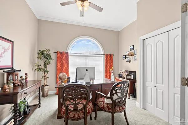 a view of a livingroom with furniture and a livingroom