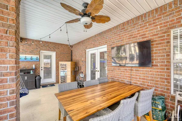 a outdoor space with lots of tables and chairs