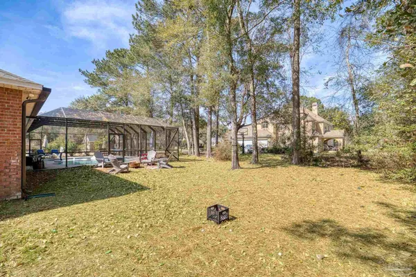 a view of swimming pool with outdoor seating