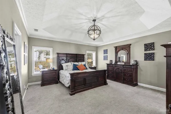 a bed room with furniture and a window