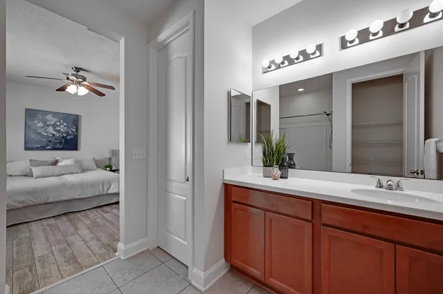 a hallway with table and chairs