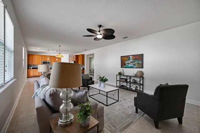 a view of storage and utility room with dryer and washer