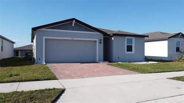a house view with a garden space