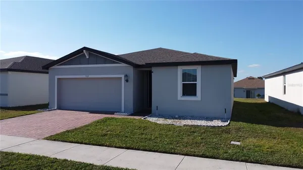 a view of a swimming pool with a terrace