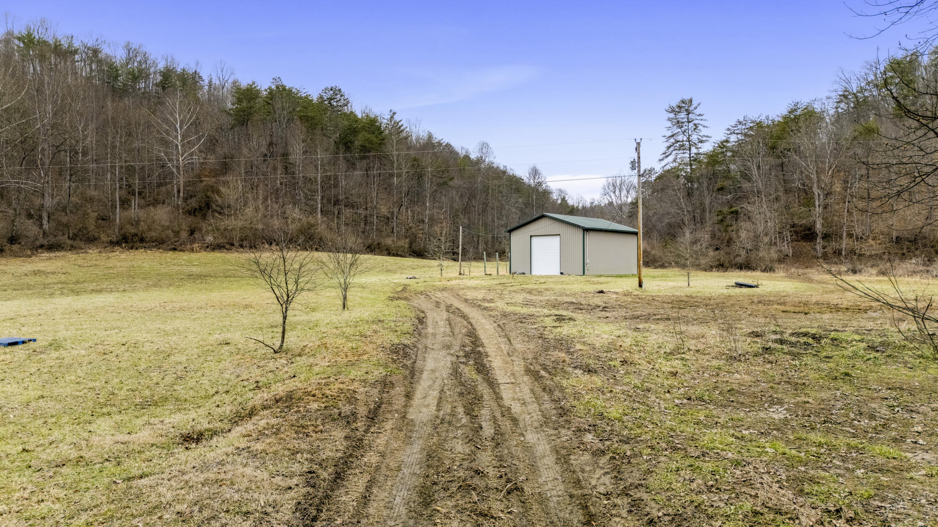1657 Cave Branch Road Campton, KY 41301 - Photo 2 of 26 DJI_20250205111922_0117_D