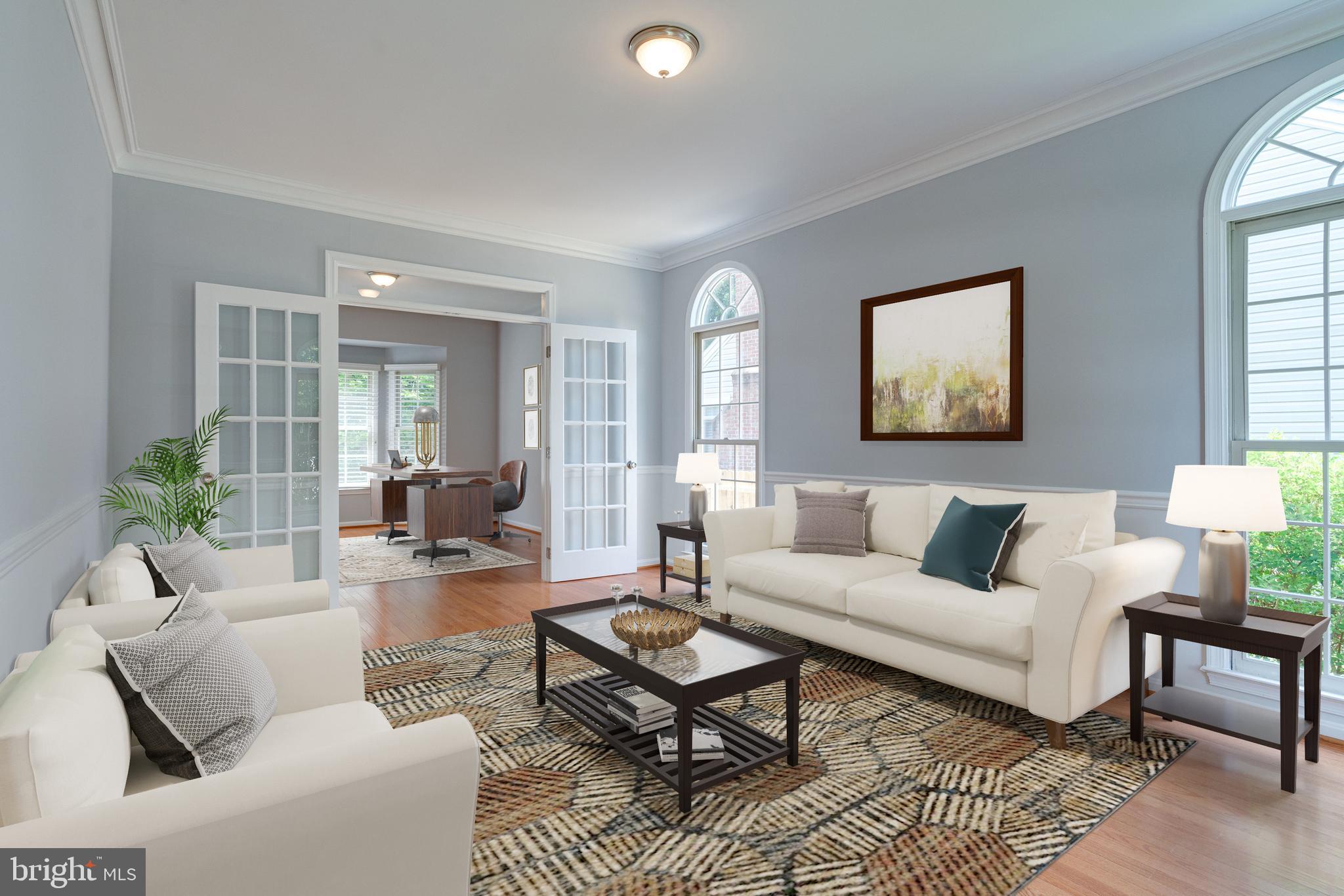 8143 Ridge Creek Way Springfield, VA 22153 - Photo 12 of 75 The living room is virtually staged for ideas.
