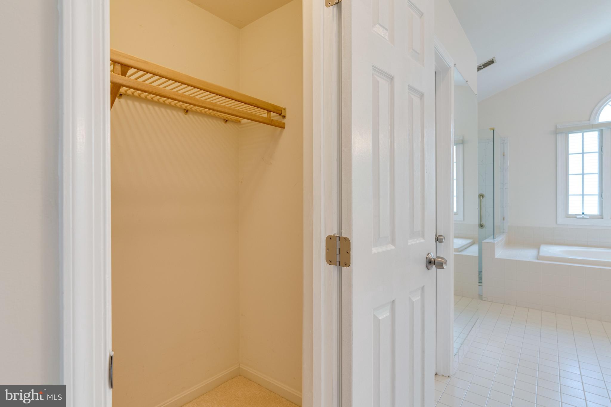 8143 Ridge Creek Way Springfield, VA 22153 - Photo 57 of 75 Her/his closet in the master bedroom