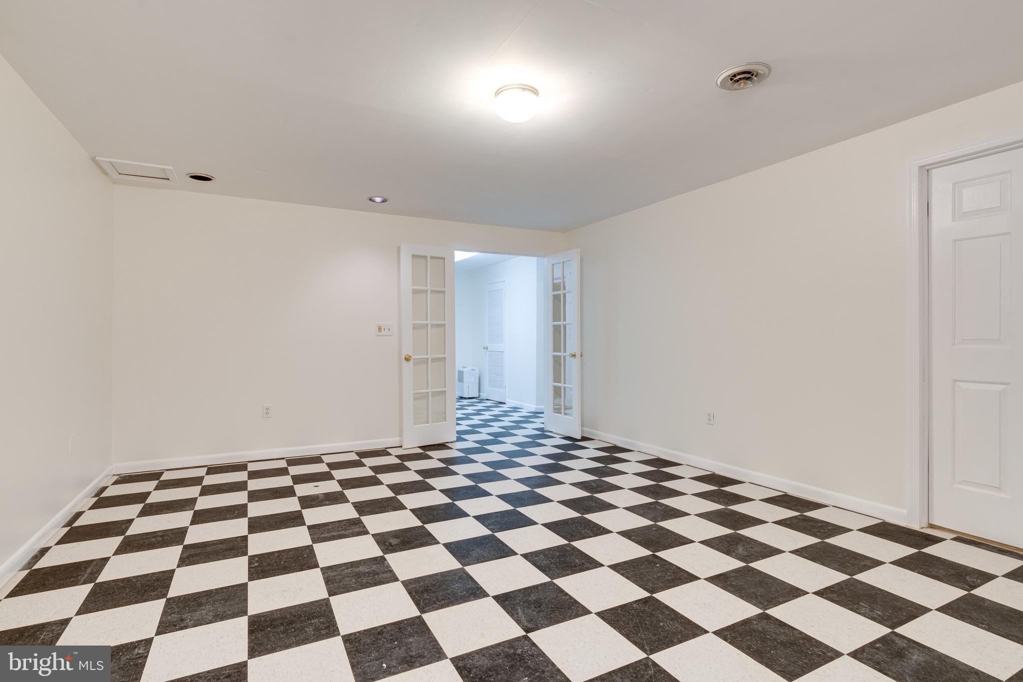 8143 Ridge Creek Way Springfield, VA 22153 - Photo 63 of 75 Playroom/Man Cave in the Basement