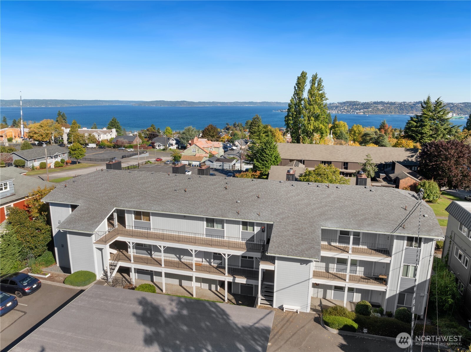 1010 North J Street, Unit 2 Tacoma, WA 98403 - Photo 1 of 29 an aerial view of a house with a ocean view