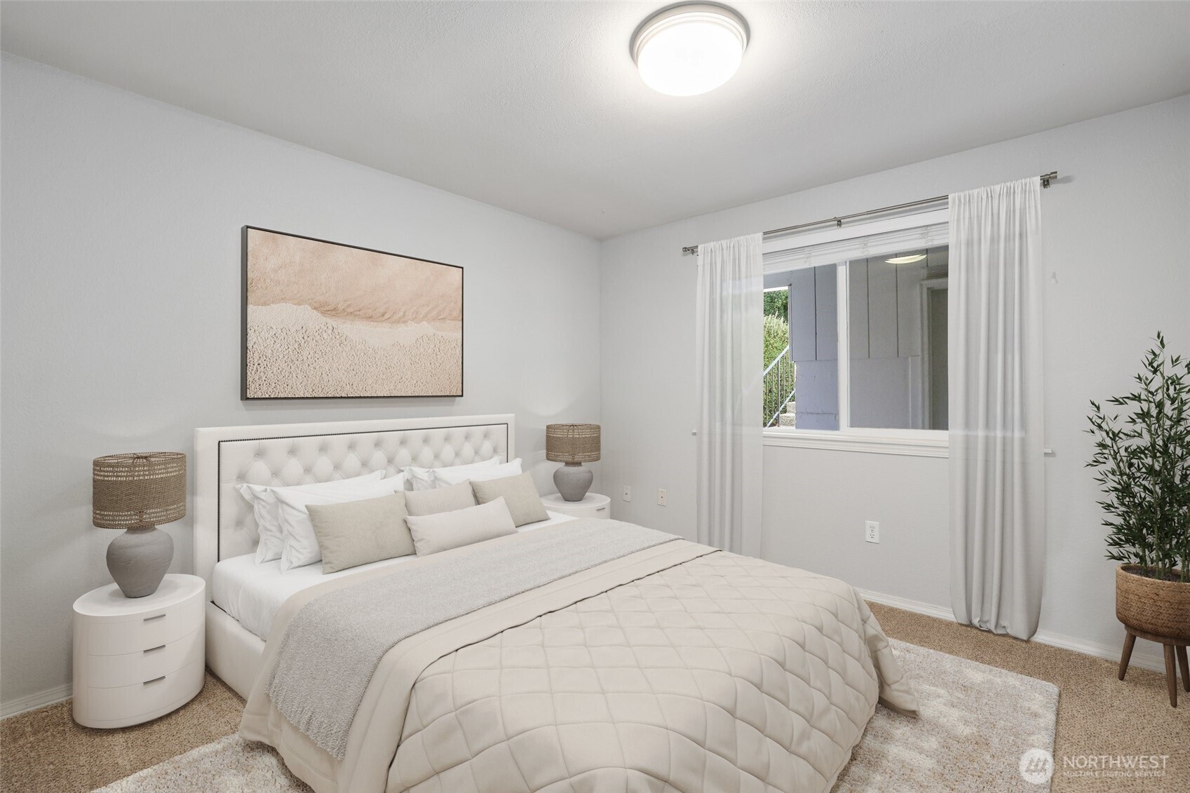 1010 North J Street, Unit 2 Tacoma, WA 98403 - Photo 16 of 29 a bedroom with a bed and a painting on the wall