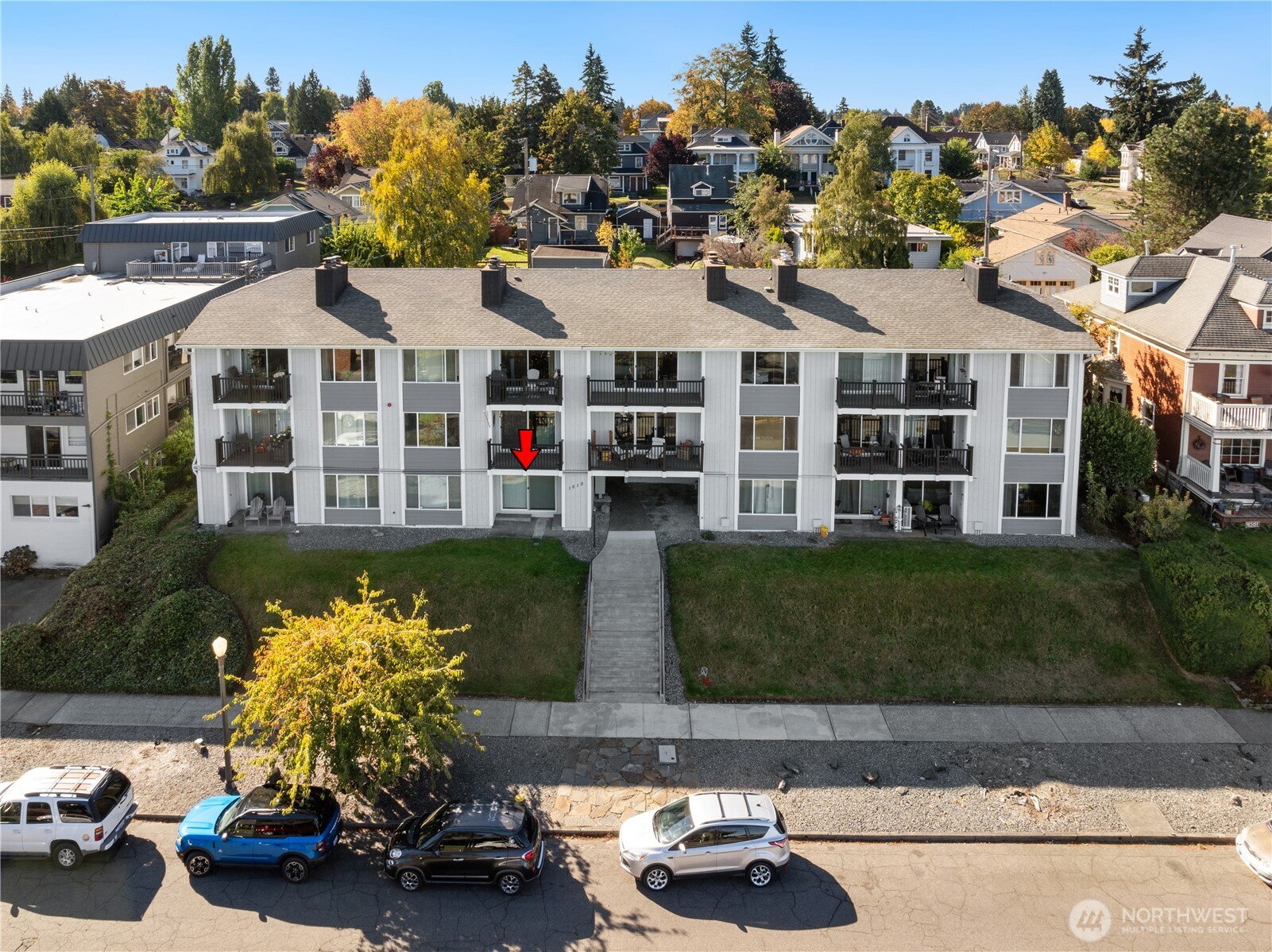 1010 North J Street, Unit 2 Tacoma, WA 98403 - Photo 24 of 29 a front view of a house with a yard