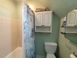 240 Sycamore Street, Unit 1 Watertown, MA 02472 - Photo 3 of 5 a bathroom with a toilet and a shower
