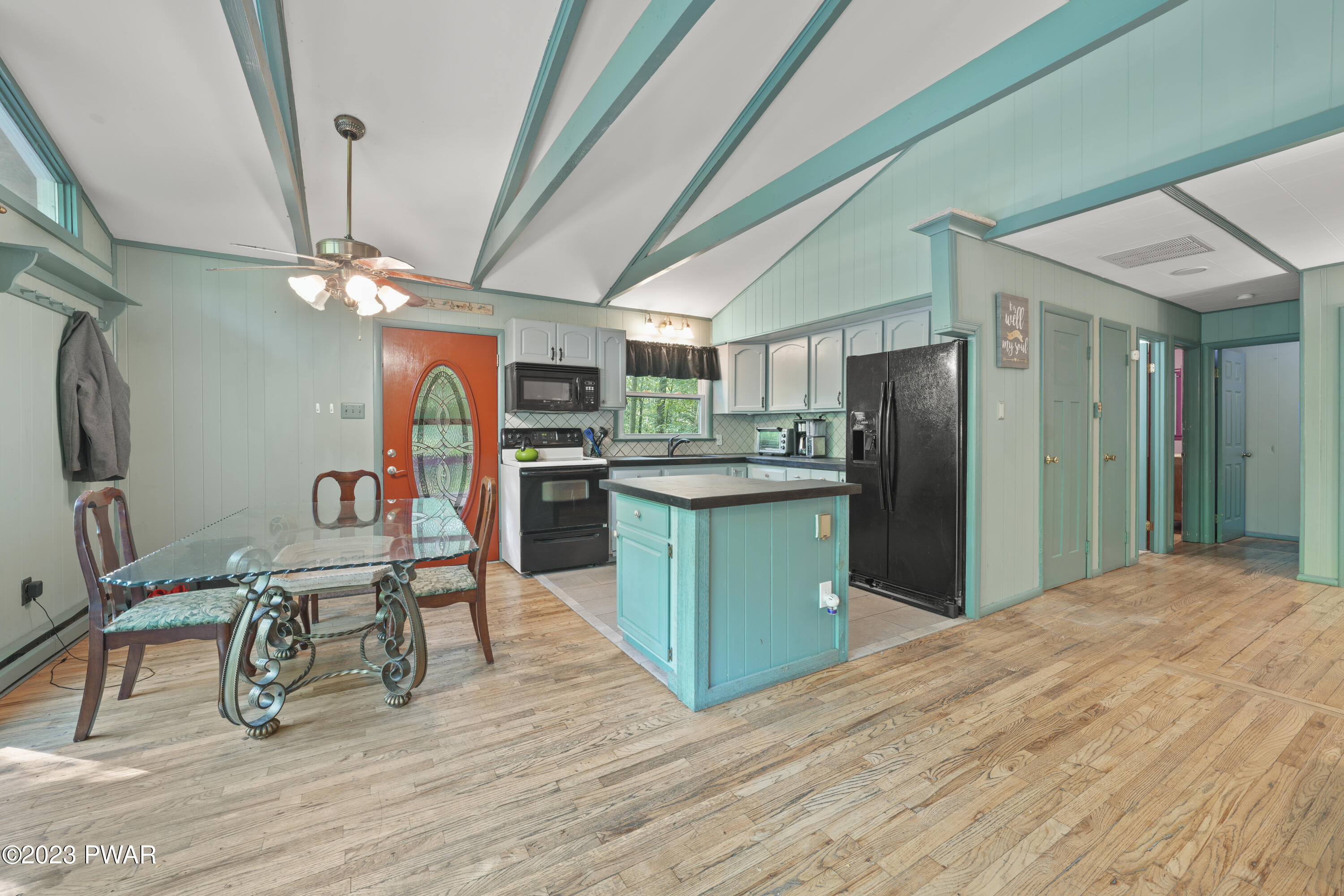 161 Butternut Road Milford, PA 18337 - Photo 8 of 26 a kitchen with stainless steel appliances kitchen island a refrigerator and a table
