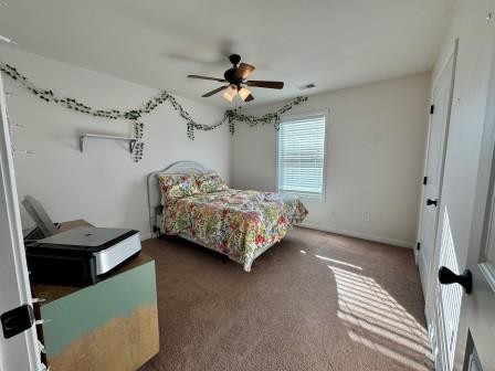 610 Rolling Meadows Lane Rickman, TN 38580 - Photo 16 of 42 a bedroom with a bed and a chandelier