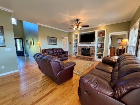 610 Rolling Meadows Lane Rickman, TN 38580 - Photo 21 of 42 a living room with furniture a flat screen tv and a fireplace