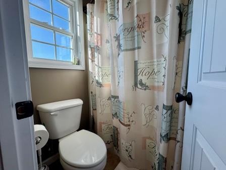 610 Rolling Meadows Lane Rickman, TN 38580 - Photo 26 of 42 a white toilet sitting next to a bathroom sink