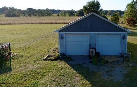 610 Rolling Meadows Lane Rickman, TN 38580 - Photo 33 of 42 a backyard of a house with lots of green space and lake view