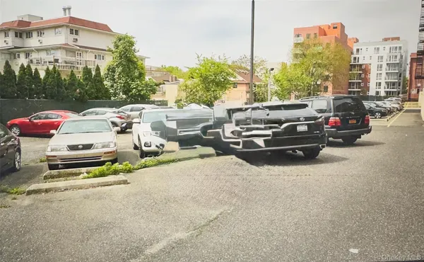 a view of a street with cars